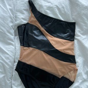 Norma Kamali mesh and black swimsuit